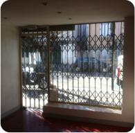 Grille coulissante extensible commerce.